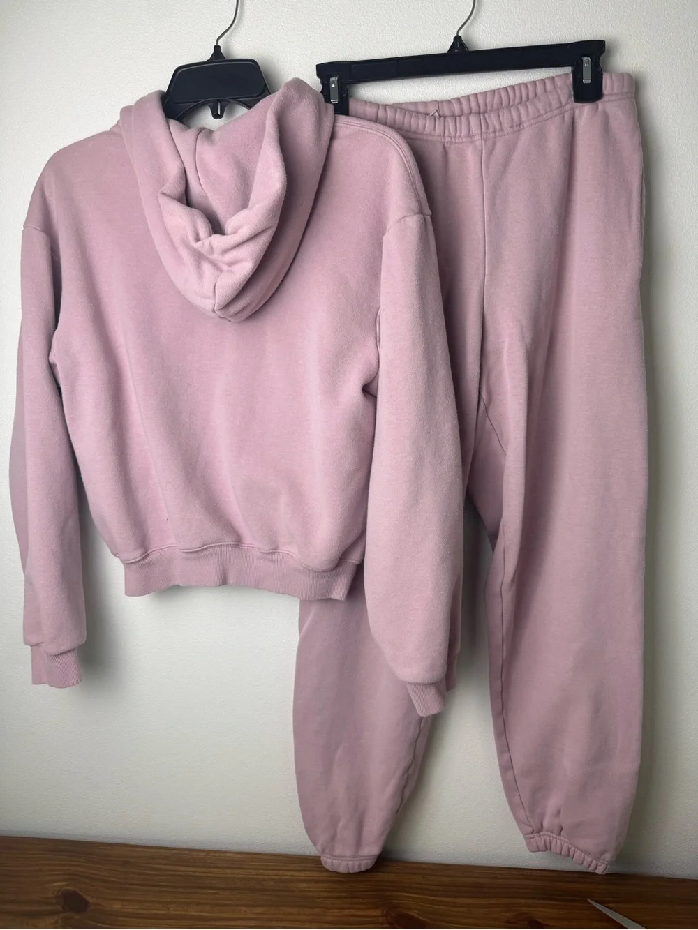 SKIMS Light Pink Hooded Zip Sweatshirt and Jogger Set. Top SM, bottoms XS